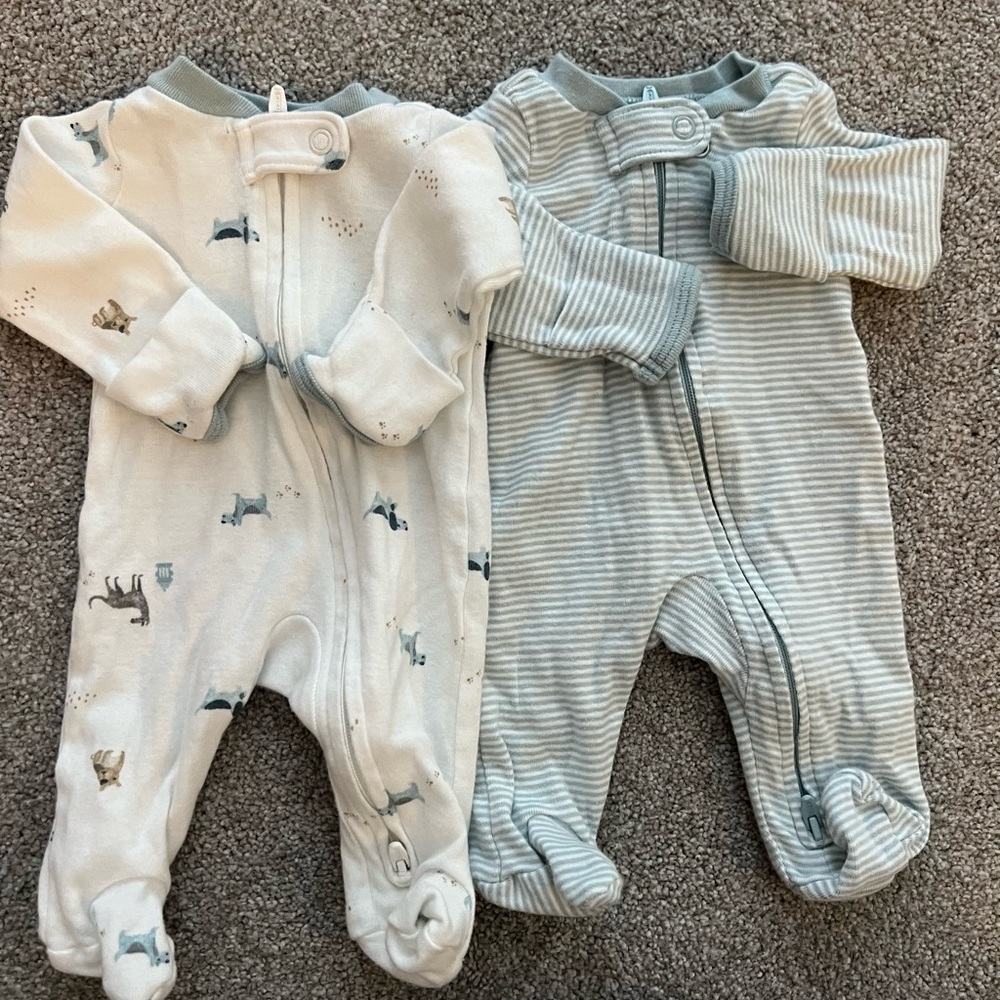 Selling set of two Carter Preemie sleepers.